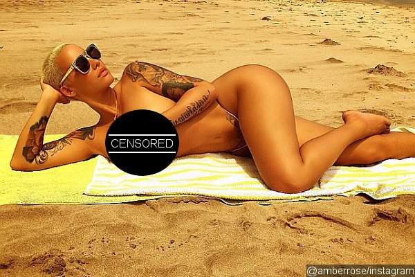 Amber Rose Fails to Cover Her Nipples in Nearly Nude Beach Pic
